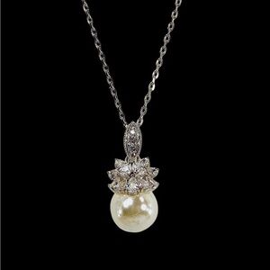 White round pearl pendant necklace with clear crystals set on top New